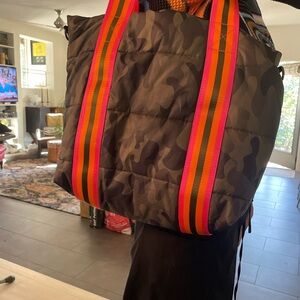 Haute shore Camouflage Quilted Tote Bag with Neon Stripe Handles. Used one time.
